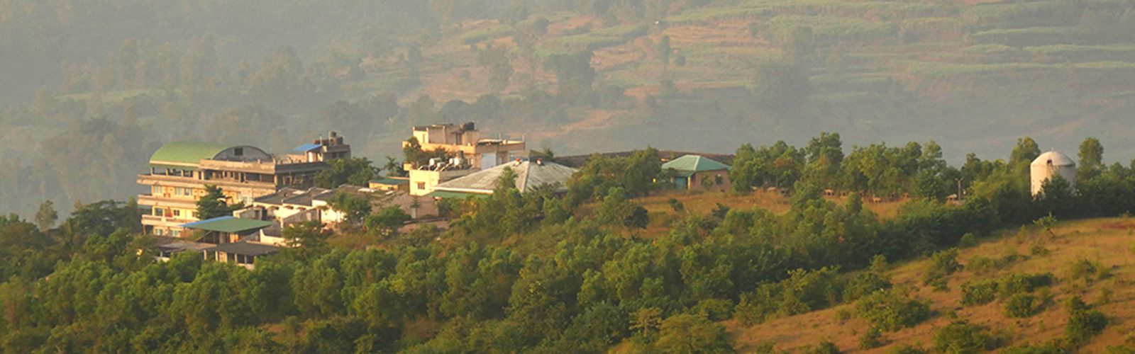 Anandkunj campus on a forested hillside